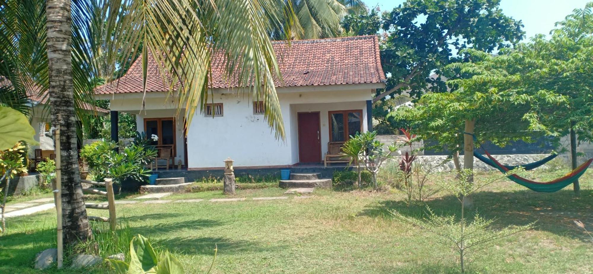 Dewi Garden Guesthouse Kuta  Esterno foto