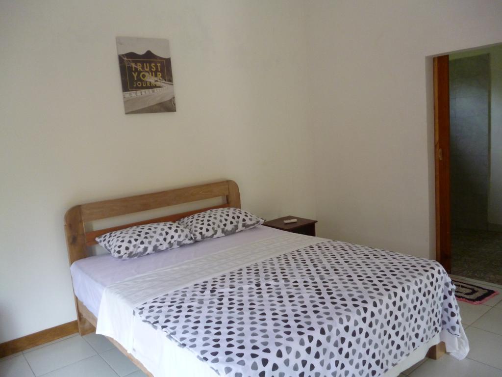 Dewi Garden Guesthouse Kuta  Esterno foto