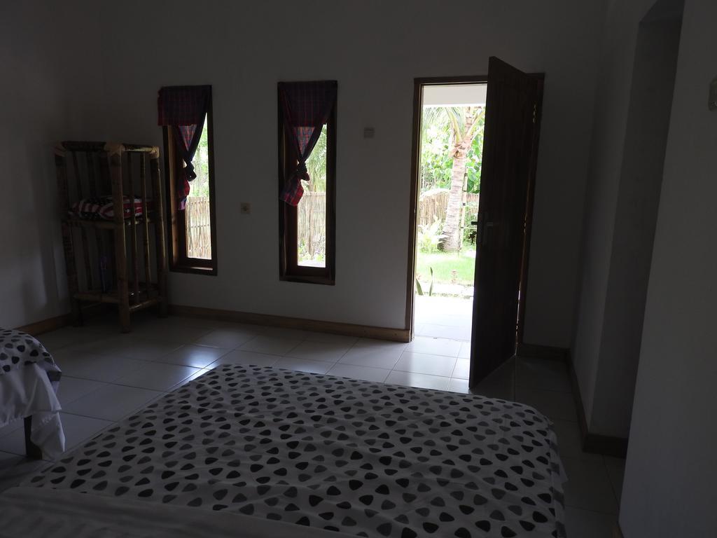Dewi Garden Guesthouse Kuta  Esterno foto