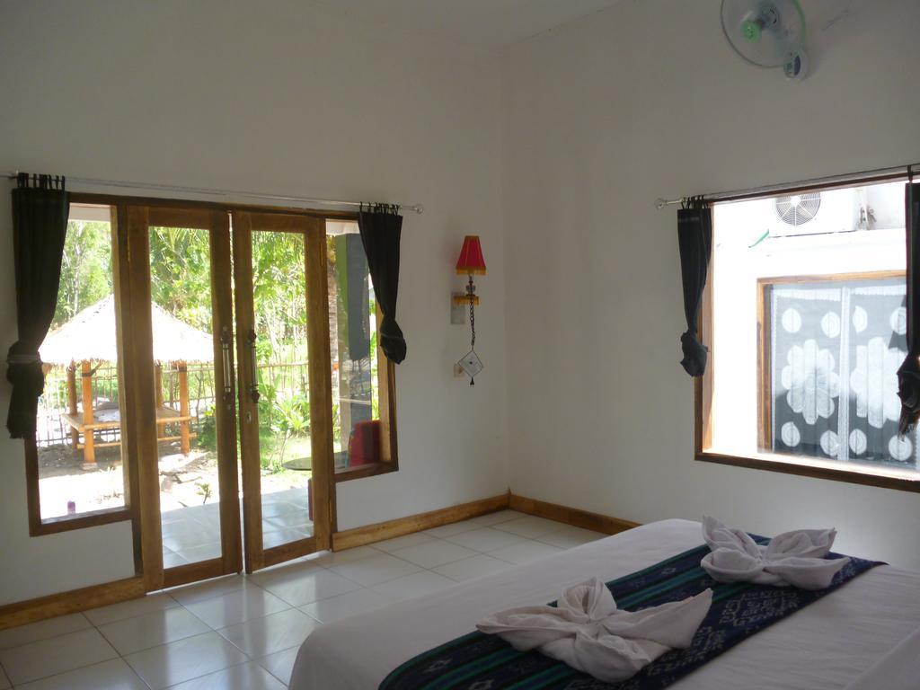 Dewi Garden Guesthouse Kuta  Esterno foto