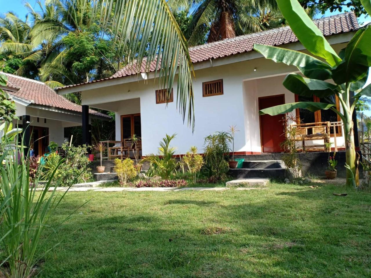 Dewi Garden Guesthouse Kuta  Esterno foto